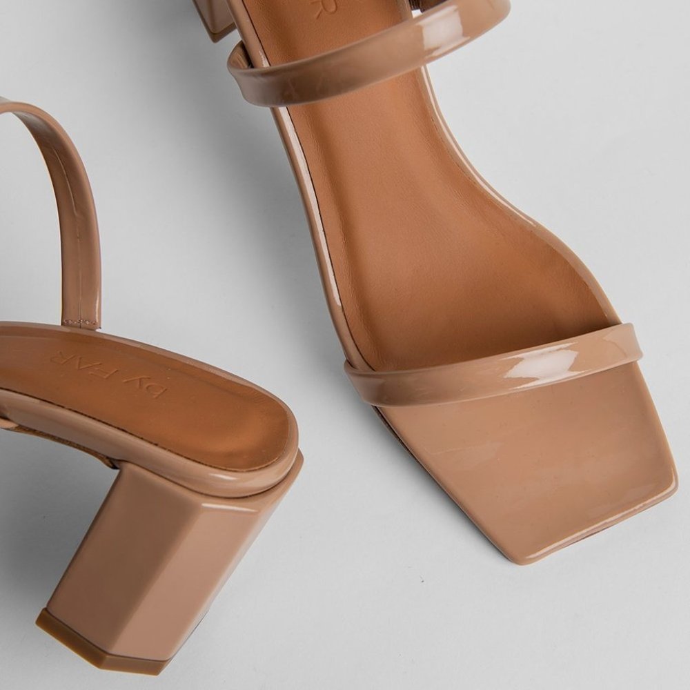 By Far Tanya Patent Mule Sandals in Nude